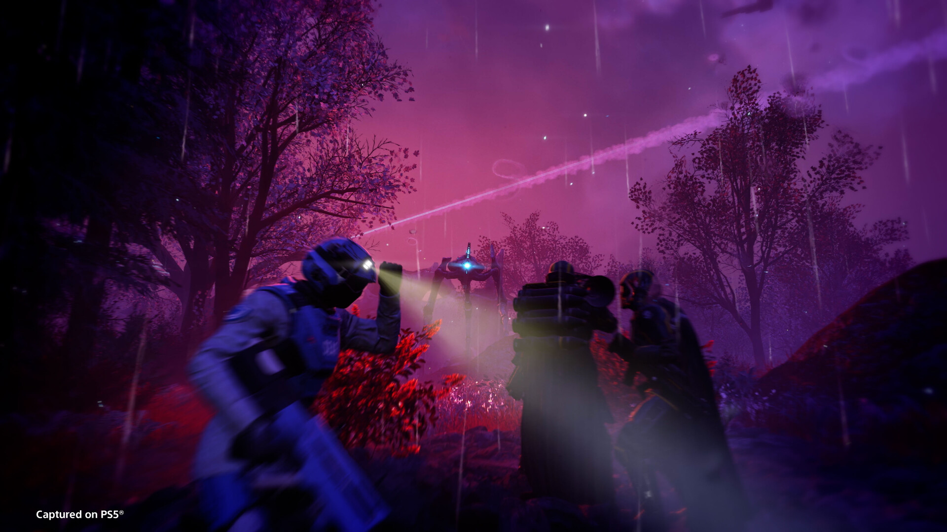 A Helldiver stands amid a burning battlefield in a representative Helldivers 2 screenshot marked Captured on PS5.